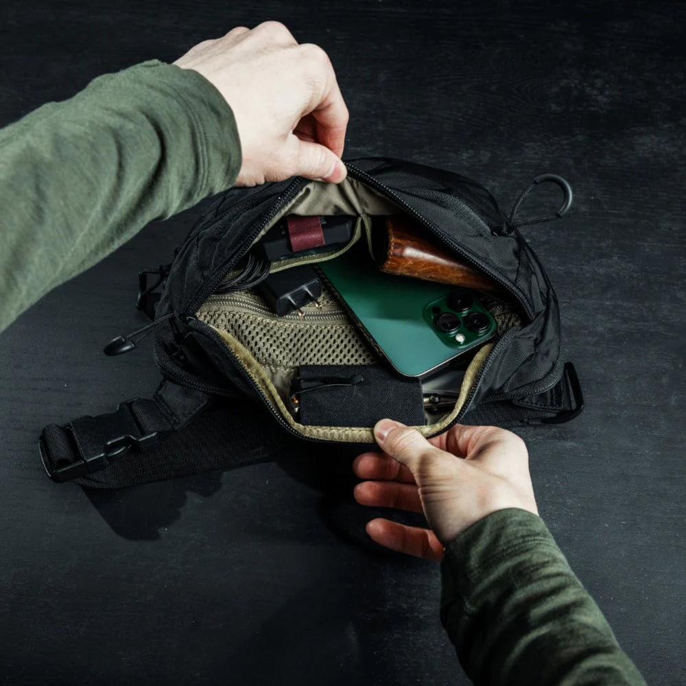 typical everyday essentials inside eberlestock bando bag
