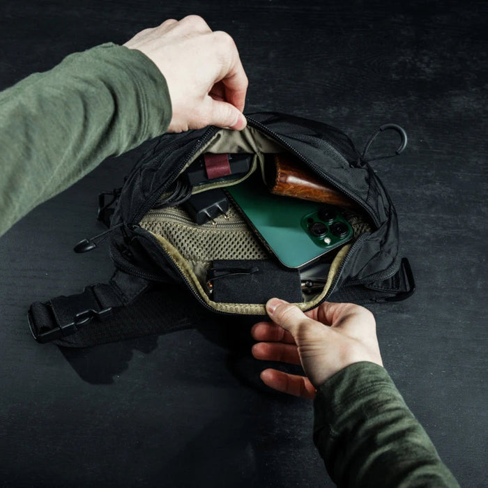 typical everyday essentials inside eberlestock bando bag
