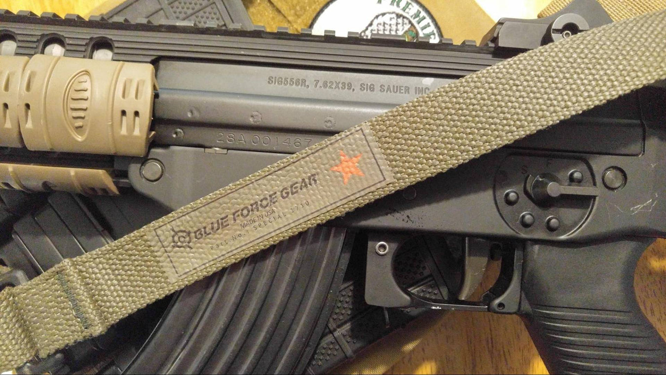 Close up photo of a Blue Force Gear Vickers Sling mounted on a Rifle