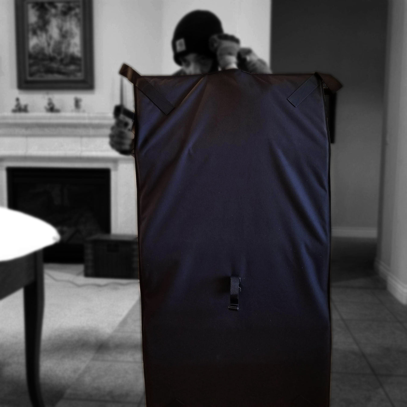 man-uses-bulletproof-blanket-as-cover