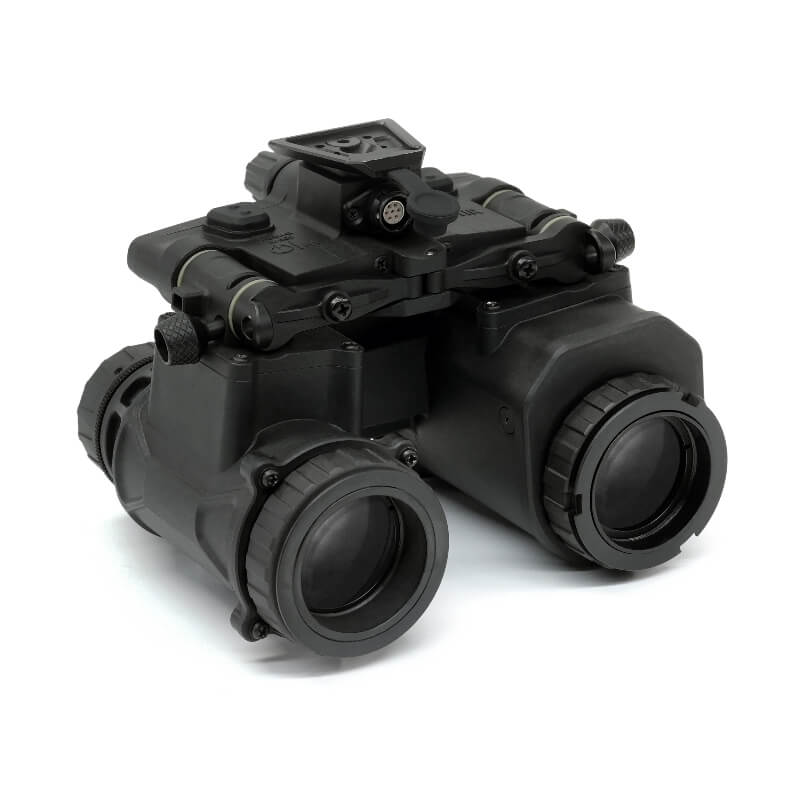 Rear-right isometric view of the binocular night vision device, displaying the eyepiece assemblies, bridge mechanism, and mounting interface located on the top center section.