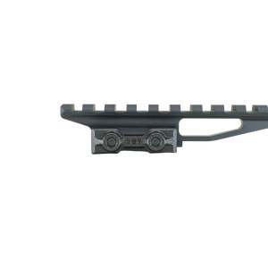 the image showcases the delta optic riser mount in the color black and is showcasing the clamp side where the optic riser mount will be mounted on the user's rifle and we can also see the ridges of where the mounts will be placed.