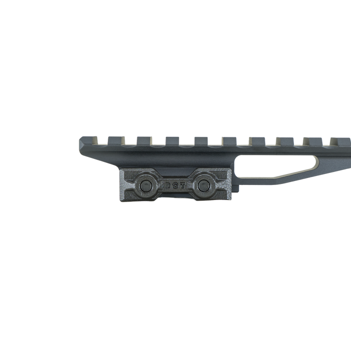 the image showcases the delta optic riser mount in the color black and is showcasing the clamp side where the optic riser mount will be mounted on the user's rifle and we can also see the ridges of where the mounts will be placed.