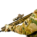 the image shocases the DOT delta optic riser mount in the color FDE or Flat Dark Earth where the item itself is being mounted on top of a weapon and the weapon itself is being held by someone who is wearing a camflauge outfit with a DOT logo patch on its arm. 