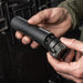 lifestyle image of the surefire fast attach hub being attached to a SOCOM556-RC3