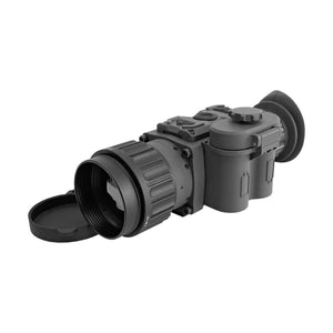 Front-angled view of the Armasight Warden thermal monocular with its lens cap off, showing the objective lens up close.