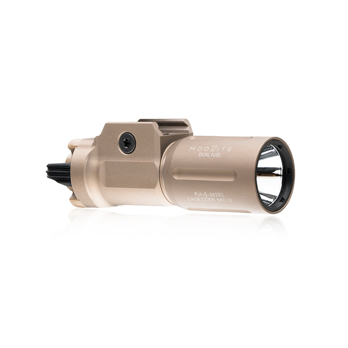 an image of the PL350 in the color flat dark earth or FDE, and has the PLHv3 light head where it is angled that you can see the right side of the item where the brand name and the words "dual fuel" is branded on it in white and we can see the attachment partition that attaches this light on a pistol.