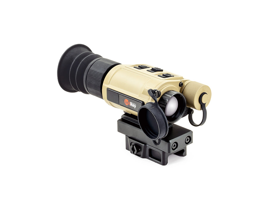 From a left-side angled perspective, the rh25 v2 thermal device is shown with its objective lens cover flipped open, highlighting its compact profile while mounted to a tactical Picatinny riser.