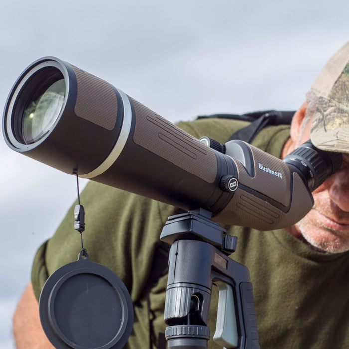 Shooter viewing the Bushnell Sentry Spotting Scope