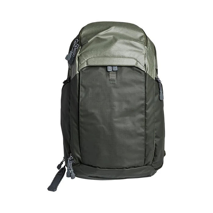 A clear frontal view of the Vertx Gamut 25L CCW Backpack showing the Heather OD and Rudder Green color scheme.