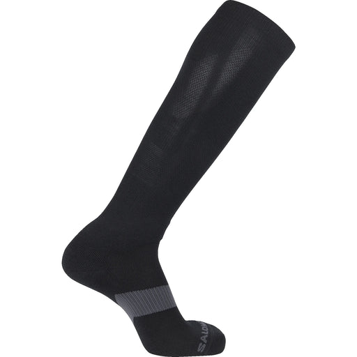 A clear profile shot of the black Salomon Quest Forces Knee Socks, displaying the full knee-high length and reinforced shin zones designed to protect against boot abrasion.