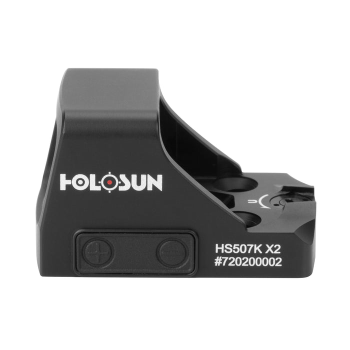 A clear side profile view of the Holosun HS507K X2 red dot sight, showing its compact size, adjustment buttons, and durable aluminum housing.