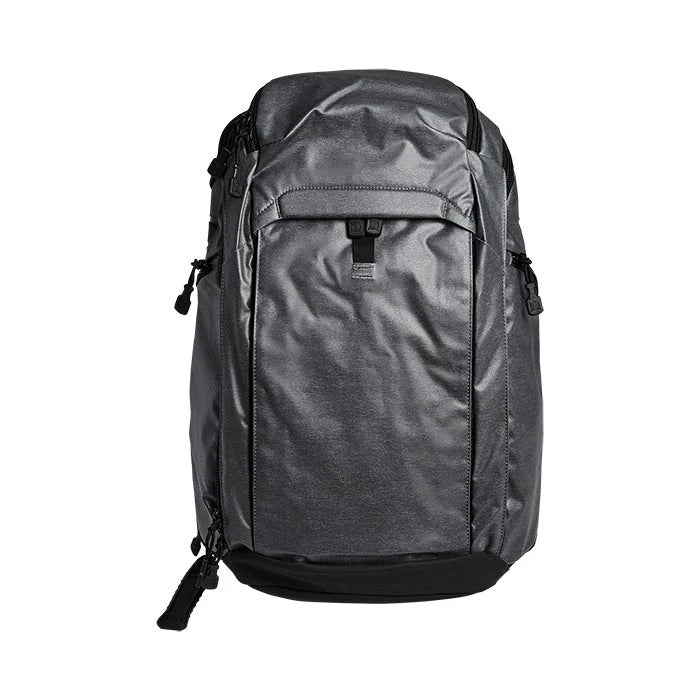A direct frontal view of the Vertx Gamut Carry Concealed Weapon Backpack in Heather Smoke Grey and It's Black, showcasing its streamlined design and convertible front panel.