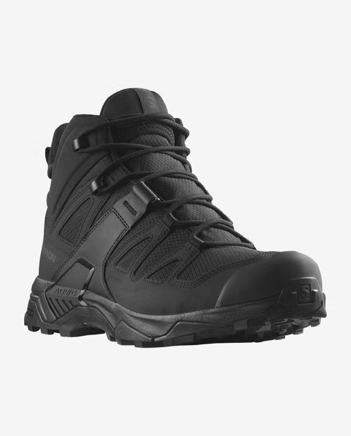 A frontal angled shot of the black Salomon X Ultra Forces Mid Gore Tex, highlighting the protective reinforced toe cap in the foreground and the breathable upper mesh body designed for high-activity ventilation.