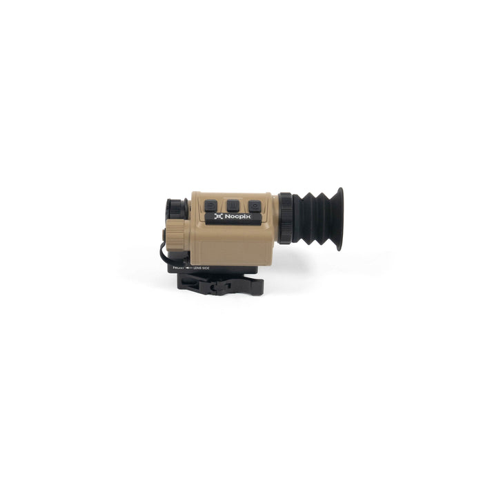 A frontal left angled isometric view of the Micro 2 H25 Thermal, showing its open objective lens aperture in the foreground, accompanied by the tan housing, top control buttons, and black rubber eyecup.