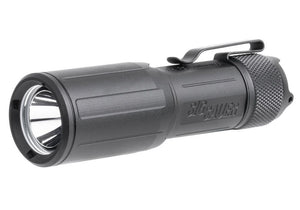 A left isometric view shows the sleek, textured body and push-button tailcap of the Sig Foxtrot EDC, highlighting its durable, easy-to-carry design.