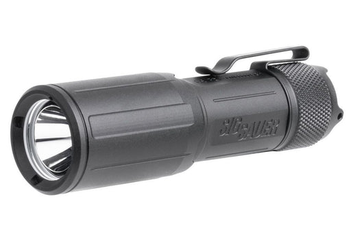 A left isometric view shows the sleek, textured body and push-button tailcap of the Sig Foxtrot EDC, highlighting its durable, easy-to-carry design.