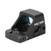 A rear left angled view of the Holosun HS507K-X2 optic, featuring the windage adjustment dial in the foreground, with the brand logo and side-mounted battery compartment clearly visible on the left.