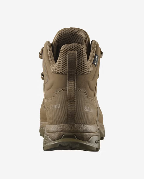 A rear view of the Coyote Brown Salomon X Ultra Forces Mid Gore Tex, featuring the rugged bootstrap in the foreground for quick entry in field conditions.