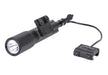 A right-angled frontal shot of the Sig Foxtrot MSR Full Size Rail Mounted White Light, displaying the remote tape switch with SureFire compatible plug and other included accessories.