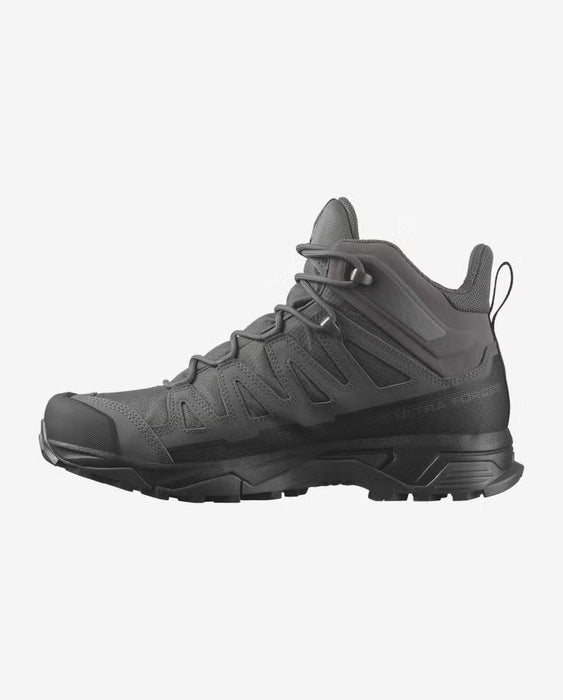 A right-side profile view of the x ultra forces mid gore-tex unisex boot in Wolf Grey, emphasizing its streamlined construction and aggressive traction for varied terrains.
