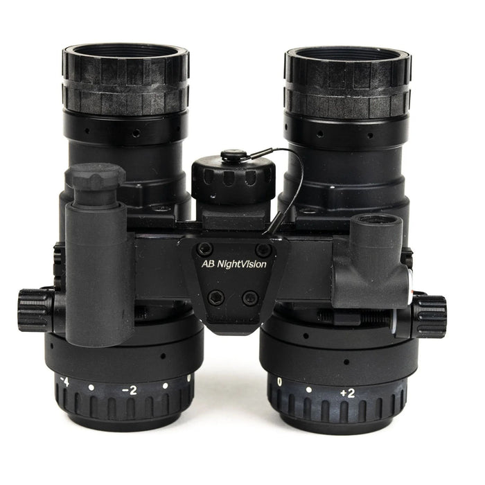 A top-down perspective of the ab rnvg, where the dovetail mounting interface and the threaded battery compartment cap are prominently situated in the foreground.