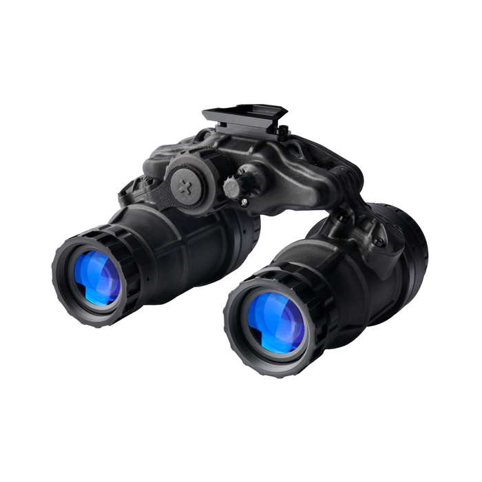 This front-left perspective of the ACT DTNVS-MG captures the lightweight, dual-tube housing that weighs under one pound. The image shows the manual gain adjustment switch and the individual monocular pods designed for professional missions and high situational awareness.