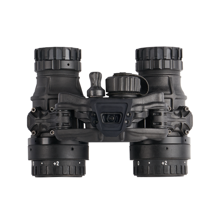 This top-down view of the Act In Black DTNVS-MG – Dual Tube Manual Gain Night Vision Goggle highlights the rugged dovetail interface in the immediate foreground, showing the secure connection point used for mounting the lightweight housing to a helmet shroud.