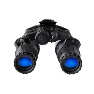 This professional frontal view showcases the ACT in Black Dual Tube Night Vision System Manual Gain, highlighting the high-performance white phosphor lenses alongside the precision manual gain adjustment knob and the secure battery compartment in the immediate foreground.