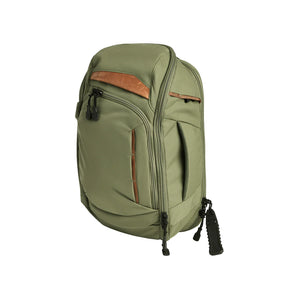 An angled studio view from the right side of the Vertx Gamut 18 Sling in the Evergreen colorway, showcasing its discreet green profile and durable 500D nylon construction.