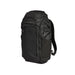 Angled side view of the black Vertx Gamut 32L backpack showing its side stretch pockets and streamlined profile.