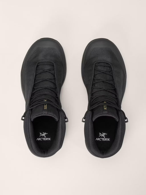 the acr'teryx kopec mid gtx hiking shoes showcased as a pair and is in the color black.