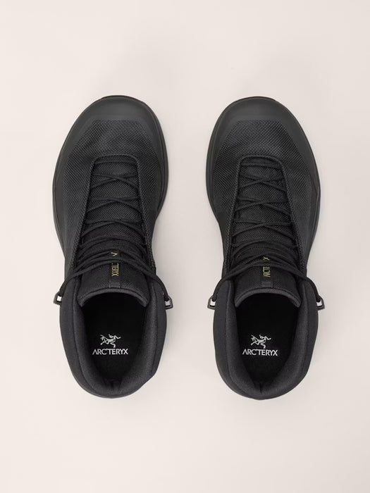 the acr'teryx kopec mid gtx hiking shoes showcased as a pair and is in the color black.