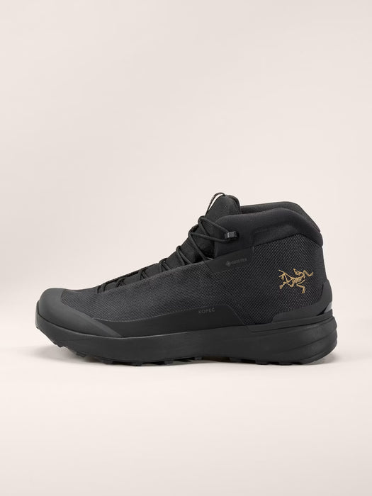 the arc'teryx kopec mid gtx in the color black showing it's textured side and the brand logo imprinted on it