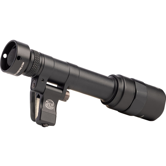 An angled rear view of the black M640T light, highlighting the hinged Scout Light Pro footprint that allows the user to rotate the body flat against the rifle for a streamlined fit.