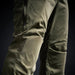 Close-up shot of the built-in knee pocket on the Camas Pro Hunting Pants, detailing how the protective neoprene knee pads stand out from the fabric for added comfort.