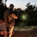 camper using the surefire edc1-dft turbo to scan surroundings 2