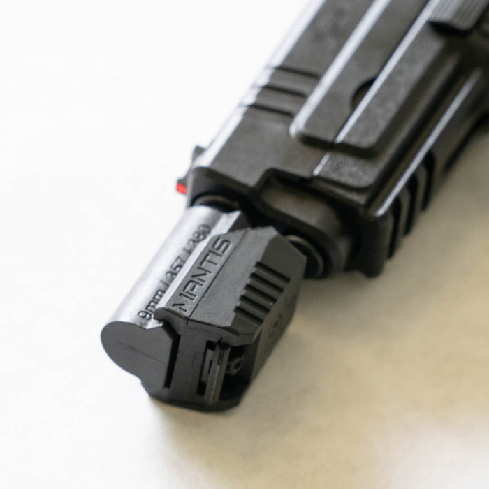 close-up-of-9mm-357-380-mantisx-br4-borerail-picatinny-rail-adapter-mounted-to-pistol