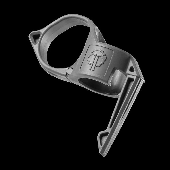 close up of an urban grey switchback ring against a black background