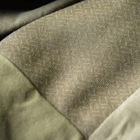 Close-up view of the lightweight nylon ripstop fabric on the Eberlestock Alturas Hooded Jacket.
