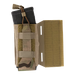 A close-up detail of the MultiCam Crye Precision LPV Side Radio Pouch carrying a black M4 magazine, highlighting the removable, adjustable shock cord with a tan pull tab that provides secure, customizable gear retention.