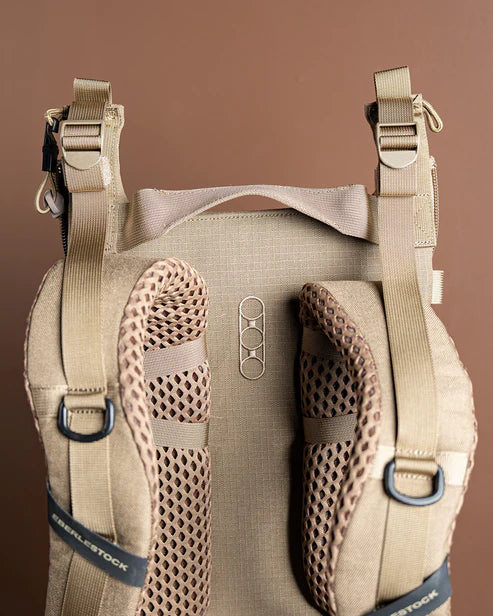 A detailed close-up of the Eberlestock Mainframe II Pack Frame harness system, highlighting the new elevated load lifters and the breathable mesh padding on the contour straps.