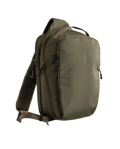 Eberlestock Fade Sling XL in olive green, front three-quarter view showing the top carry handle, front zippered pockets, and padded shoulder strap.