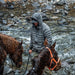 eberlestock-mccall-hooded-down-jacket-protects-man-from-elements-while-guiding-horses