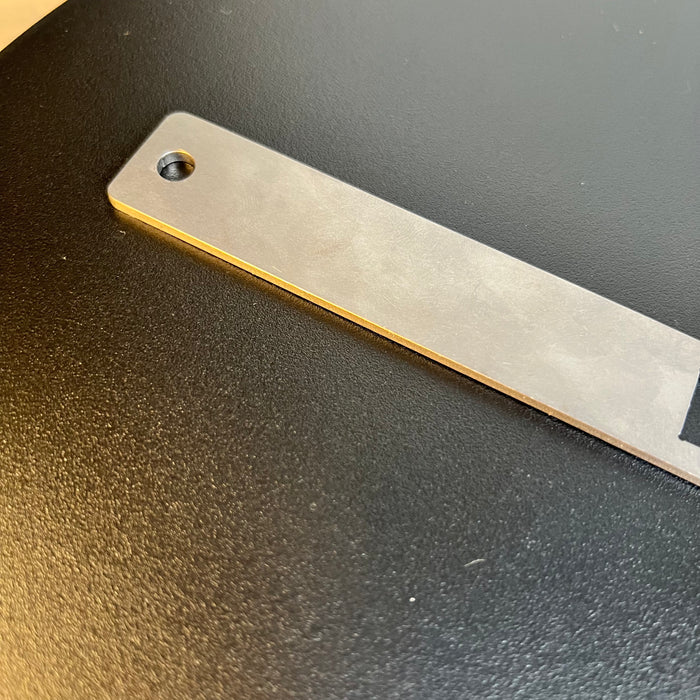 End of the Spanner Tool featuring a hole for better organization and storage.