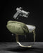 the image shows us the eberlestock fade flex micro in the color variant of olive and is suspended midair with a gun right above it trying to emphasize how the gun came from the product.