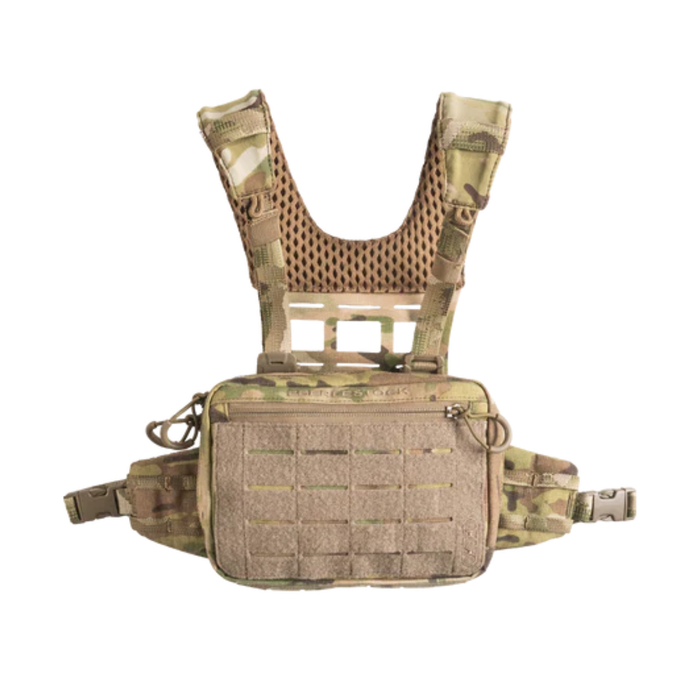 A front-facing view of an multicam tactical chest pack laying flat, featuring a breathable mesh harness and a front zippered pocket with laser-cut mounting points.