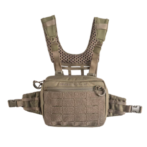 A front-facing view of an olive green tactical chest pack laying flat, featuring a breathable mesh harness and a front zippered pocket with laser-cut mounting points.