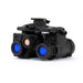 Front-right isometric view of the binocular night vision device, highlighting the dual objective lenses, central optical module, and articulating bridge assembly above the housings.
