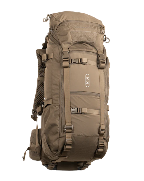 A frontal angled view of the Eberlestock Brute 3500 Pack in Dry Earth tan, showcasing the streamlined "out-of-the-box" internal frame system and the water-repellent 330D Ripstop fabric.